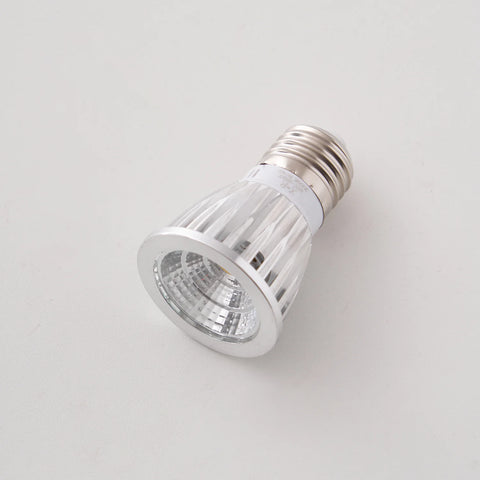 Silver LED light bulb on a white background